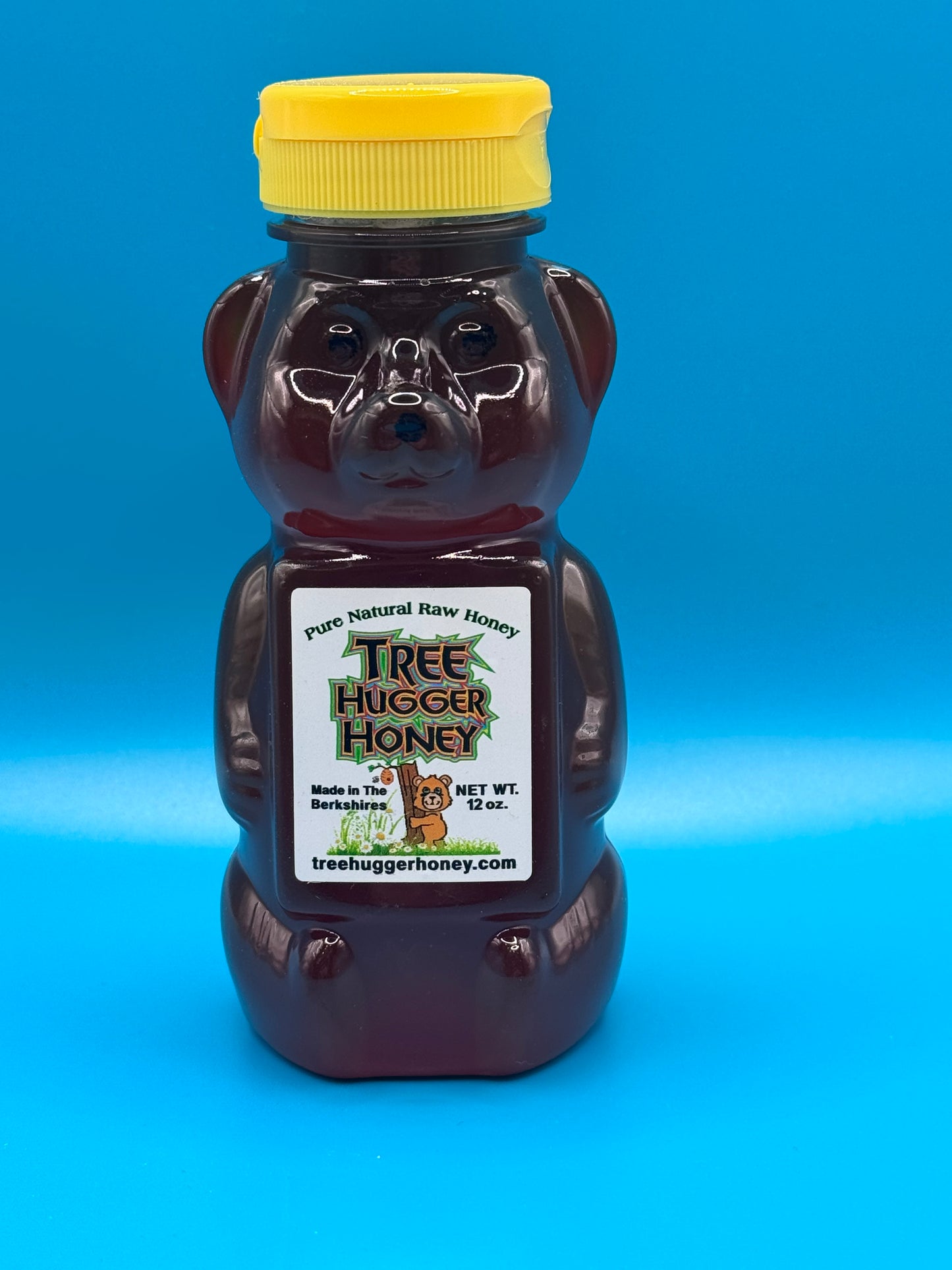 12 ounce plastic bear of natural raw honey.